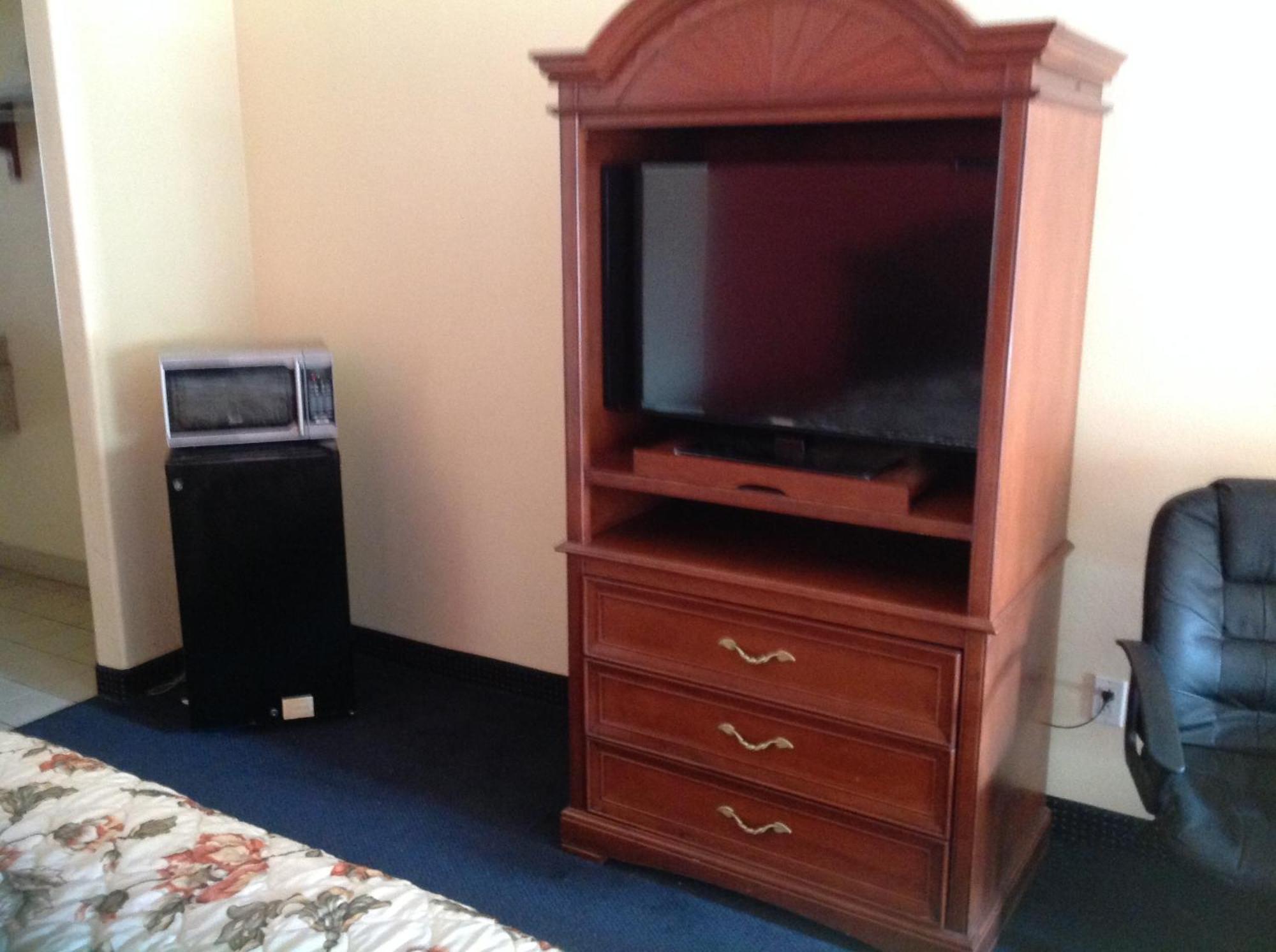 Executive Inn & Suites Shepherd Экстерьер фото