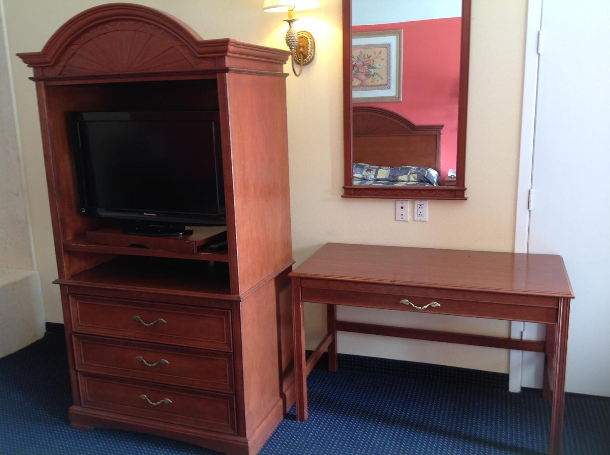 Executive Inn & Suites Shepherd Экстерьер фото
