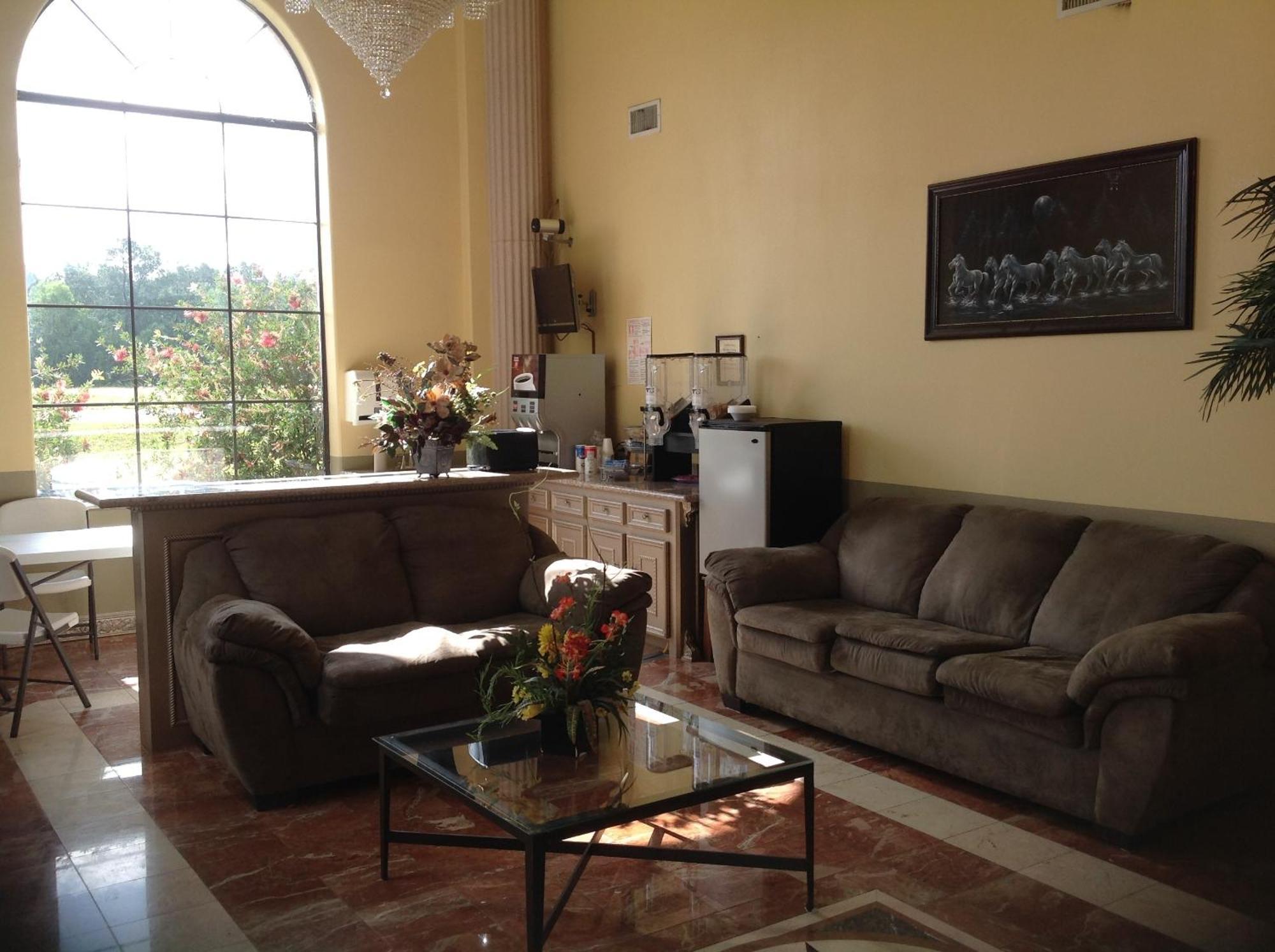 Executive Inn & Suites Shepherd Экстерьер фото
