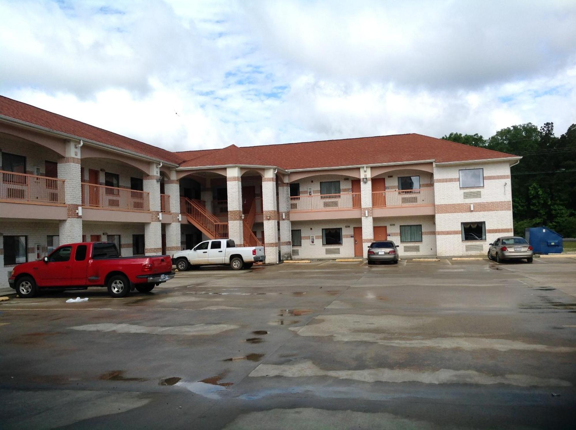 Executive Inn & Suites Shepherd Экстерьер фото