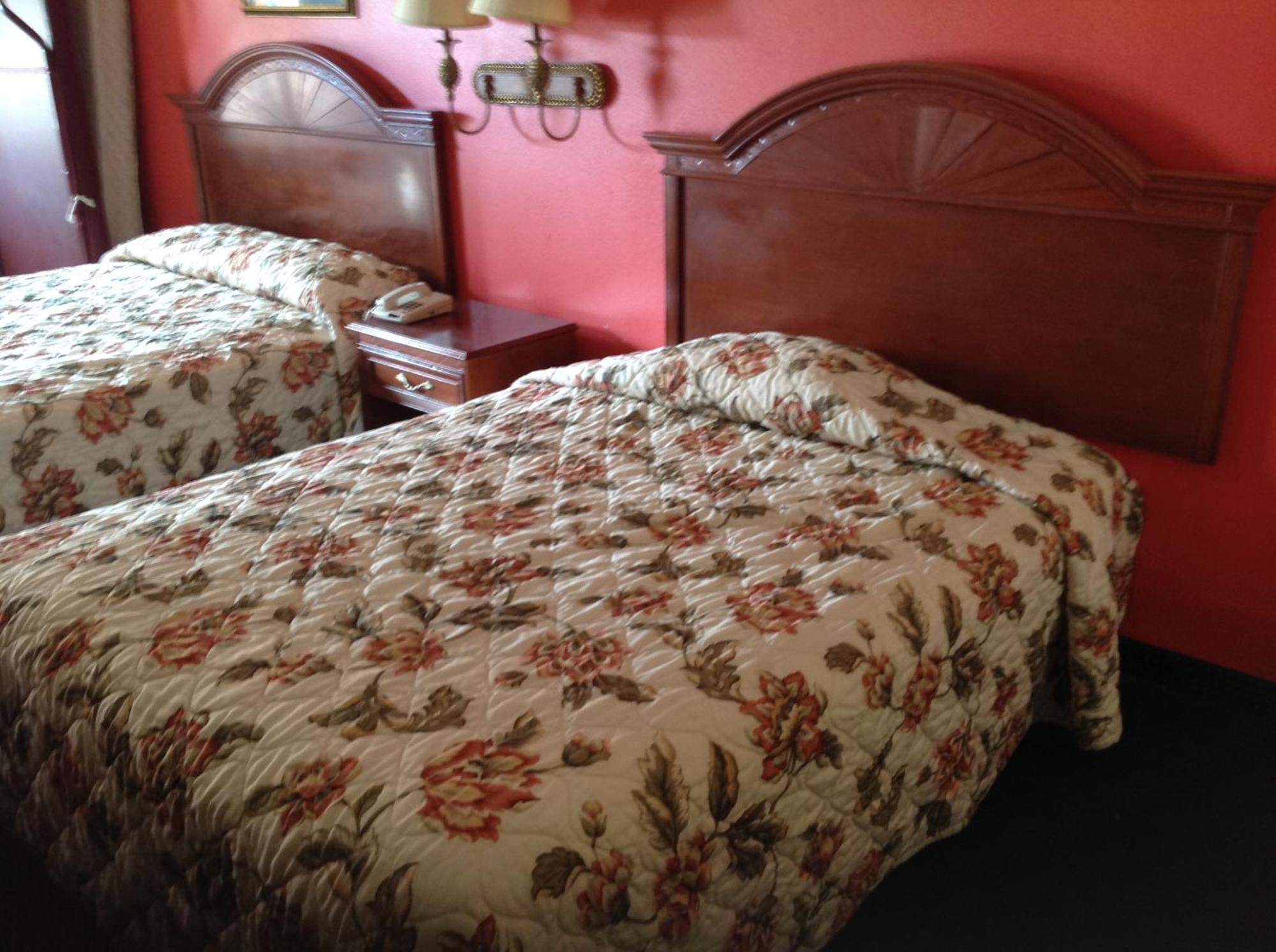 Executive Inn & Suites Shepherd Экстерьер фото