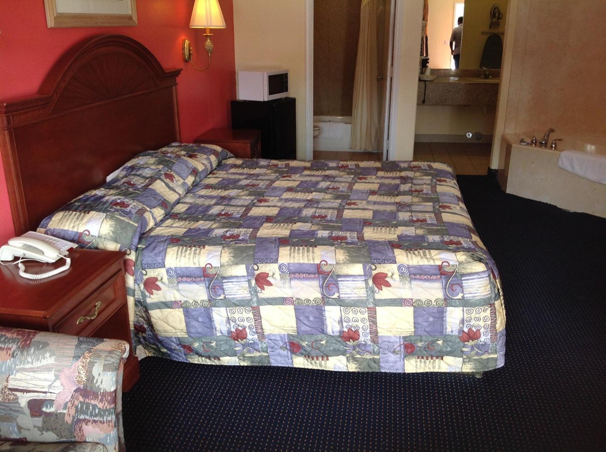 Executive Inn & Suites Shepherd Экстерьер фото